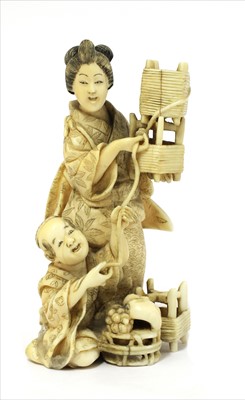 Lot 155 - A small Japanese carved ivory okimono