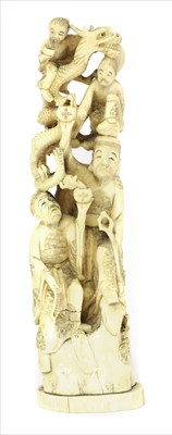 Lot 158 - A Japanese carved walrus ivory okimono