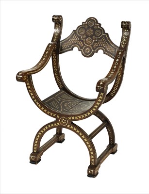 Lot 711 - A Syrian 'X' framed armchair