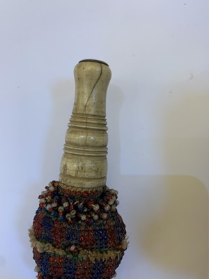Lot 188 - A fine Persian white metal and turned wood water pipe