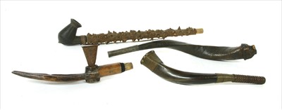 Lot 218 - Four African pipes