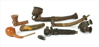 Lot 217 - Six African pipes