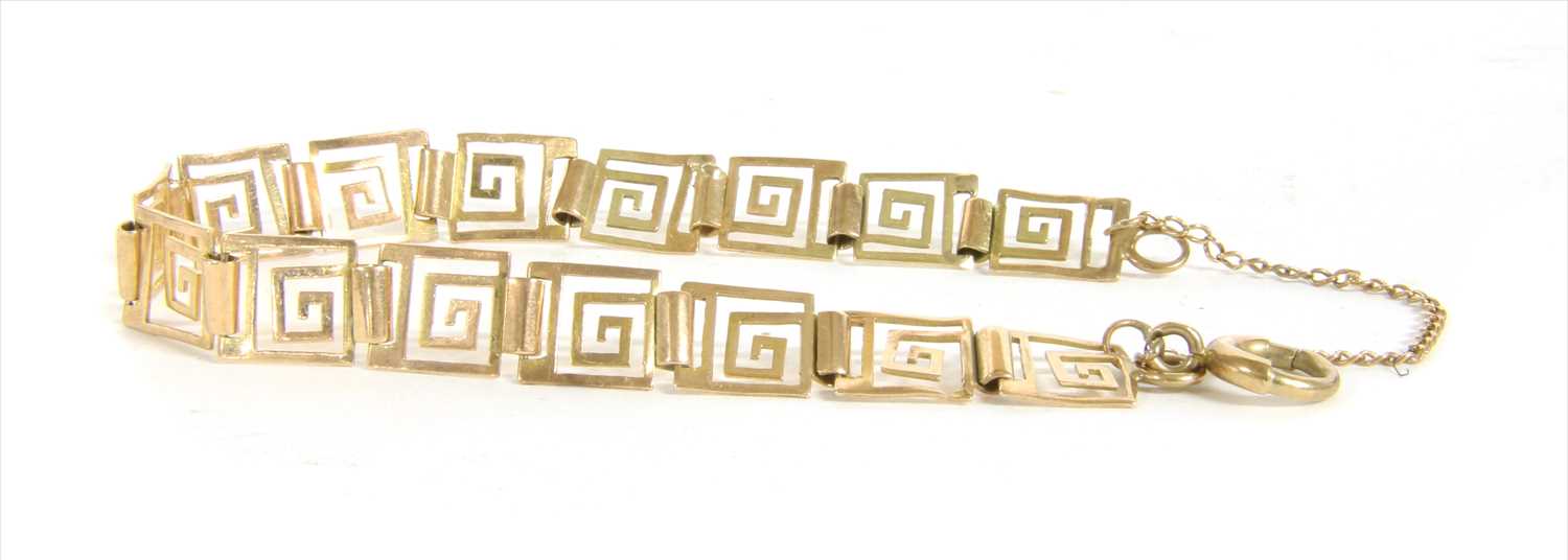 Lot 28 - A gold Greek key design bracelet