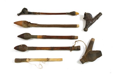 Lot 204 - Three African pipes