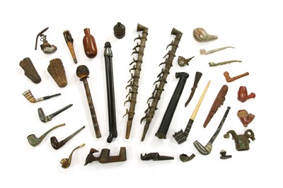 Lot 219 - A collection of African pipes