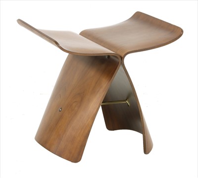 Lot 467 - A walnut butterfly stool