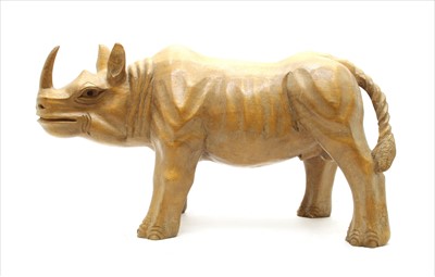 Lot 283 - A contemporary carved wooden model of a rhinoceros