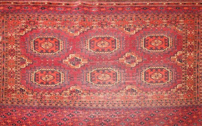 Lot 452 - A hand knotted Kazak prayer rug