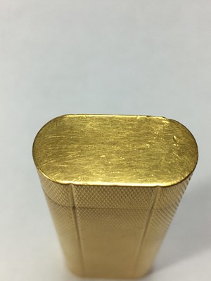 Lot 215 - A gold plated Cartier cigarette lighter