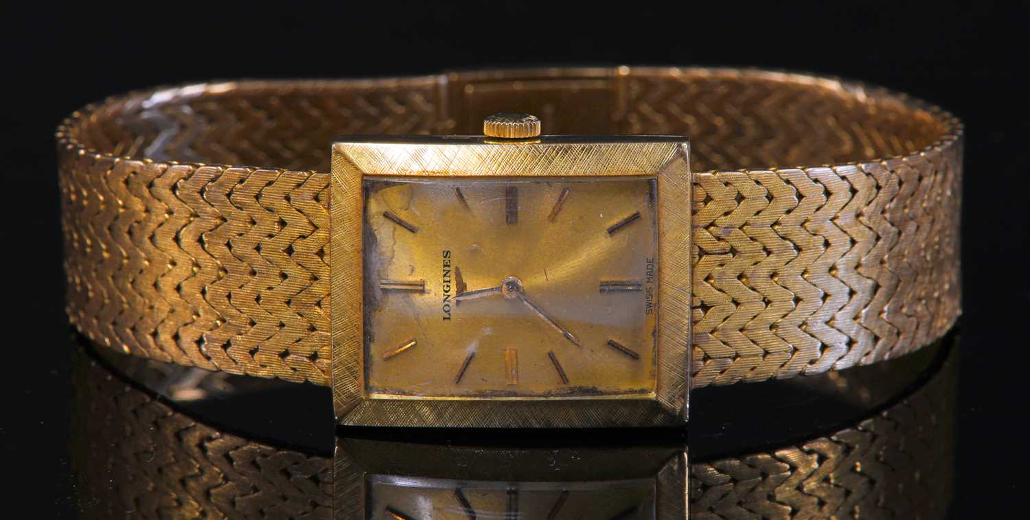 Lot 355 - A ladies' 18ct gold Longines mechanical bracelet watch, c.1960