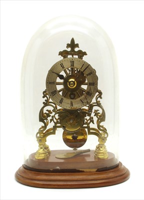 Lot 321 - A late Victorian brass skeleton clock