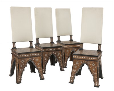 Lot 716 - A set of four Indian rosewood and inlaid chairs