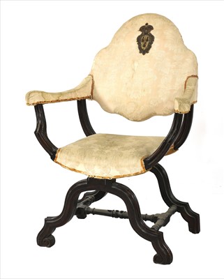 Lot 626 - A walnut 'X' framed armchair