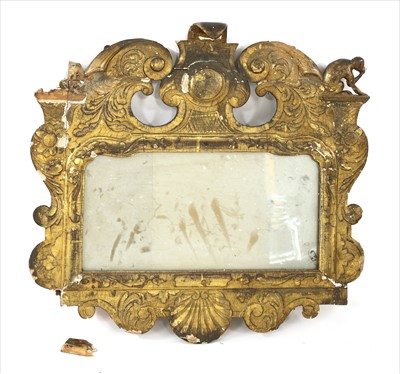 Lot 657 - A George II giltwood wall mirror