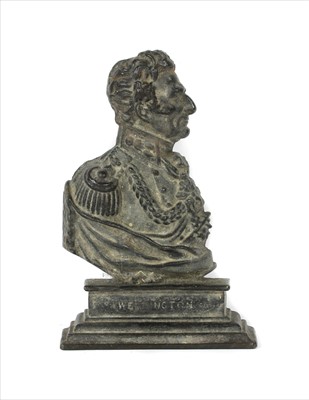 Lot 324 - A cast iron door stop with a bust of Wellington