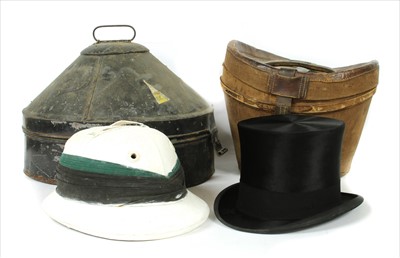 Lot 250 - A cased top hat in a leather box