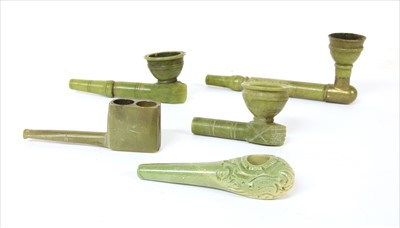 Lot 191 - Five green stone tobacco or opium pipes