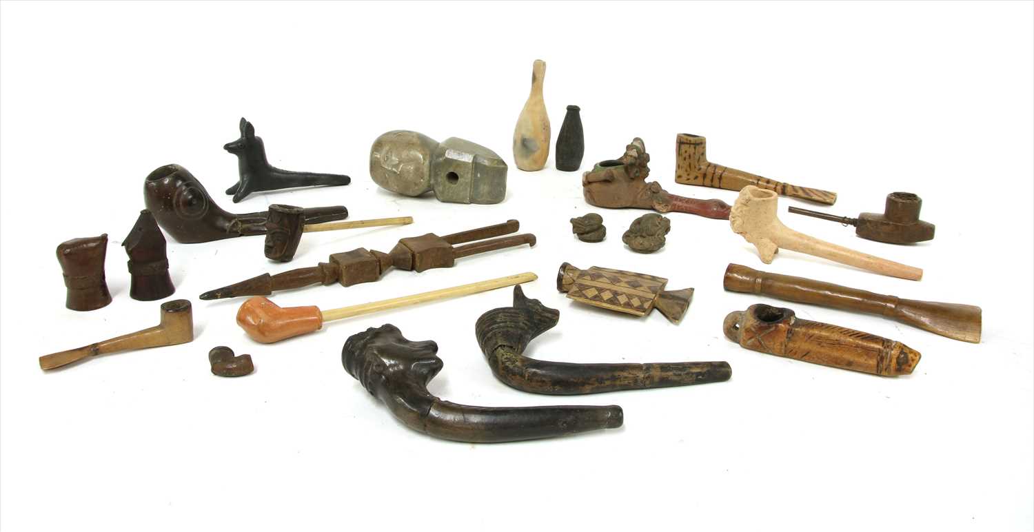 Lot 195 - A collection of  Central and South American pipes and bowls