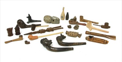Lot 195 - A collection of  Central and South American pipes and bowls