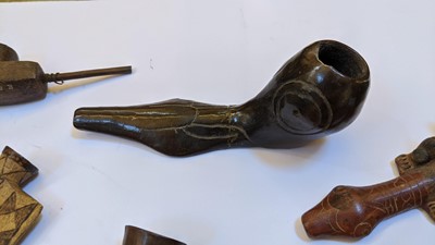 Lot 195 - A collection of  Central and South American pipes and bowls
