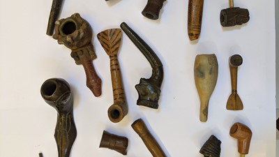 Lot 195 - A collection of  Central and South American pipes and bowls