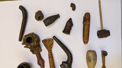 Lot 195 - A collection of  Central and South American pipes and bowls