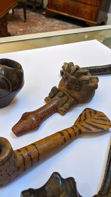 Lot 195 - A collection of  Central and South American pipes and bowls