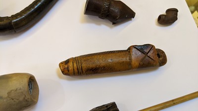 Lot 195 - A collection of  Central and South American pipes and bowls