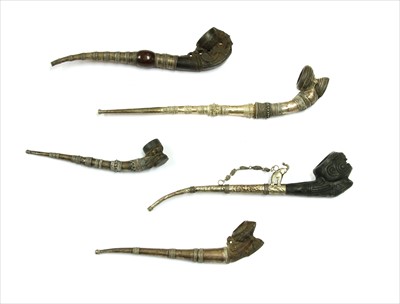 Lot 3 - Five Burmese clay-mounted pipes