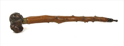 Lot 44 - A Chinese rootwood and branch opium pipe