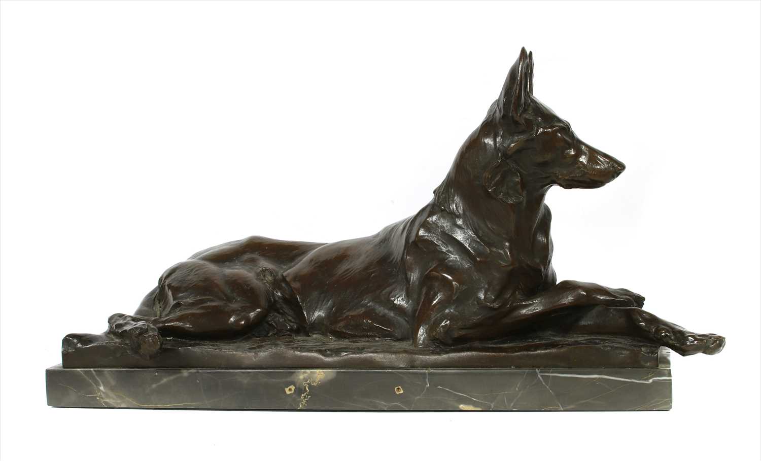 Lot 230 - A German bronze figure of a recumbent German Shepherd