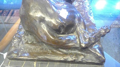 Lot 230 - A German bronze figure of a recumbent German Shepherd