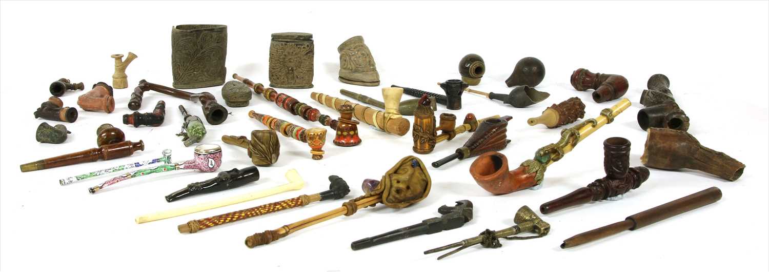 Lot 15 - A collection of Far Eastern pipes and bowls
