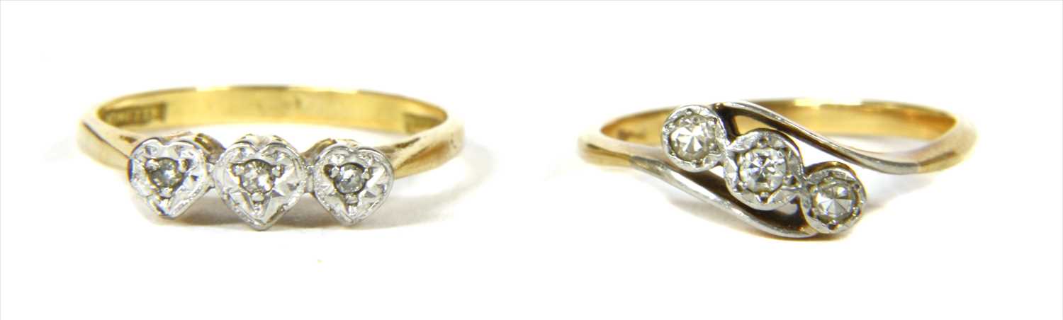 Lot 12 - A gold three stone diamond ring