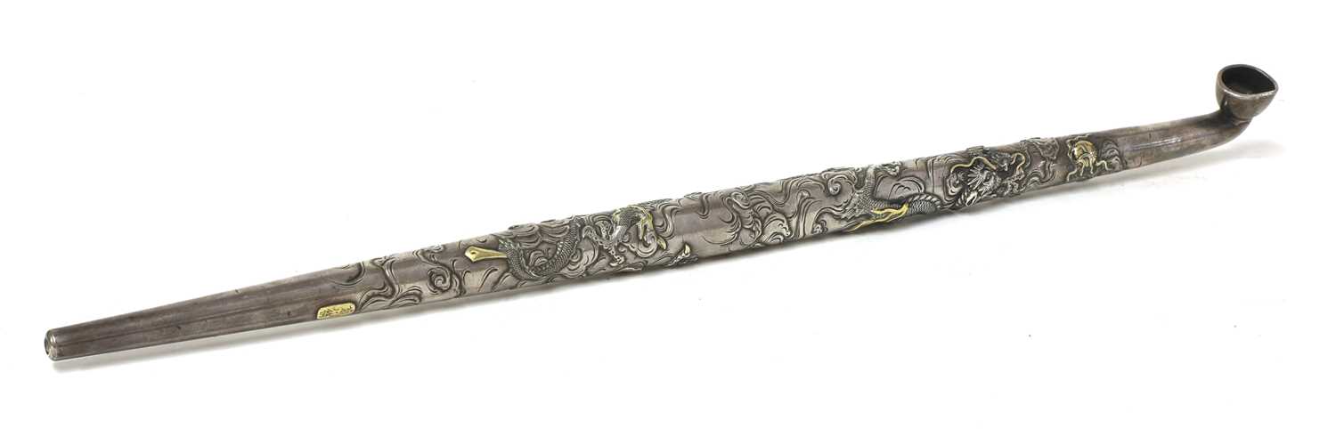 Lot 19 - A Japanese silver two-part kiseru pipe,
