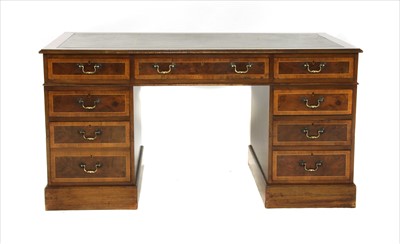 Lot 497 - An early 20th century inlaid walnut pedestal desk