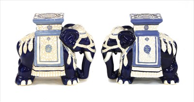 Lot 273 - A pair of ceramic elephant conservatory seats