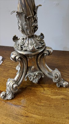 Lot 104 - A silver-plated three-branch candelabrum