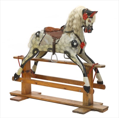 Lot 904 - A painted pine rocking horse