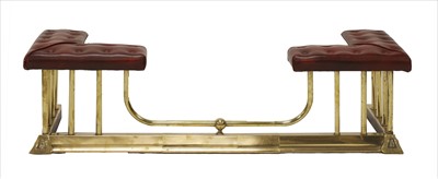 Lot 646 - A brass club fender