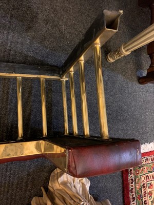 Lot 646 - A brass club fender