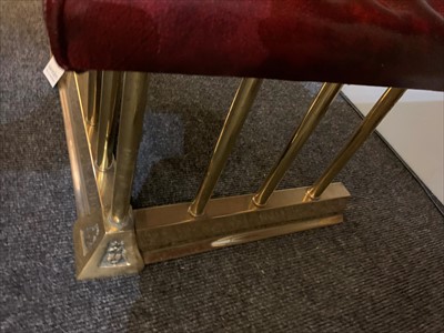 Lot 646 - A brass club fender