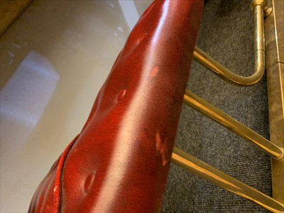 Lot 646 - A brass club fender
