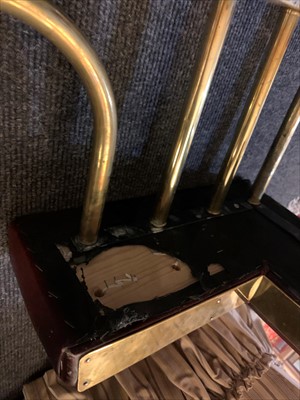 Lot 646 - A brass club fender