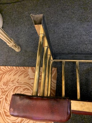 Lot 646 - A brass club fender