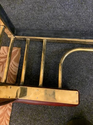 Lot 646 - A brass club fender