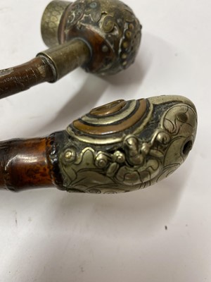 Lot 56 - Two Chinese copper and silvered pipe bowls