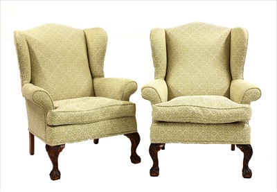 Lot 835 - A pair of wing back armchairs