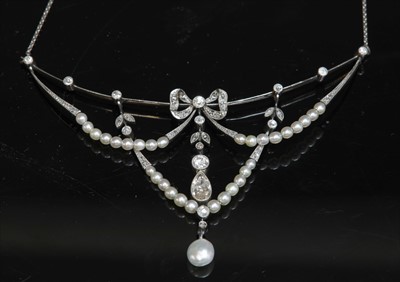 Lot 86 - A Belle Époque pearl and diamond garland-style swag necklace, c.1910