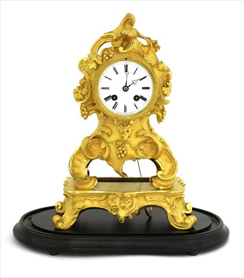 Lot 636 - An ormolu mantel clock